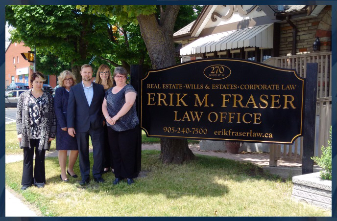 Erik M. Fraser and staff